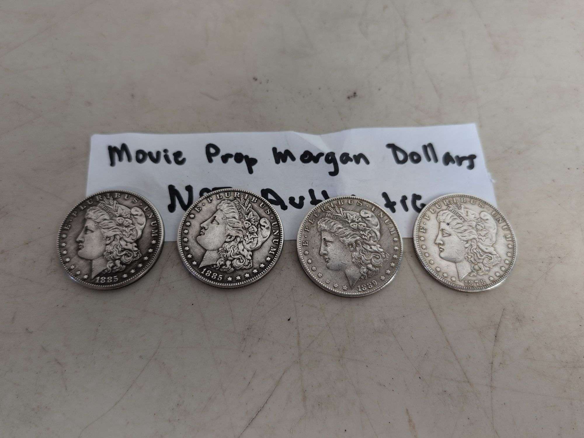 (4) movie prop Morgan Dollars - not authentic