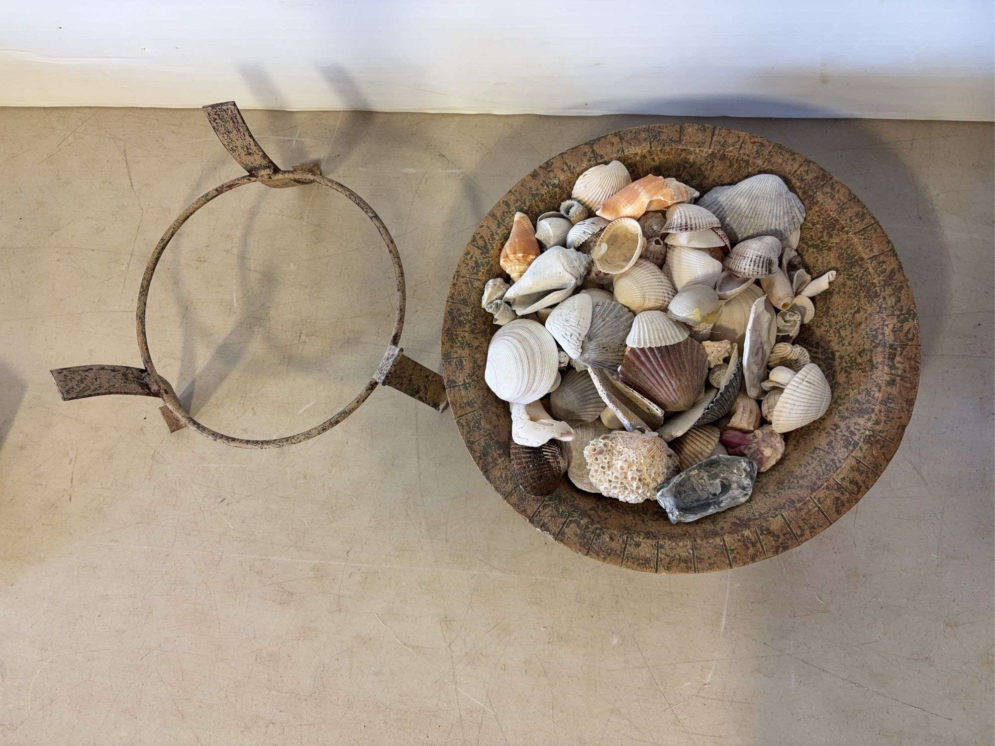 Decorative bowl with stand and shells