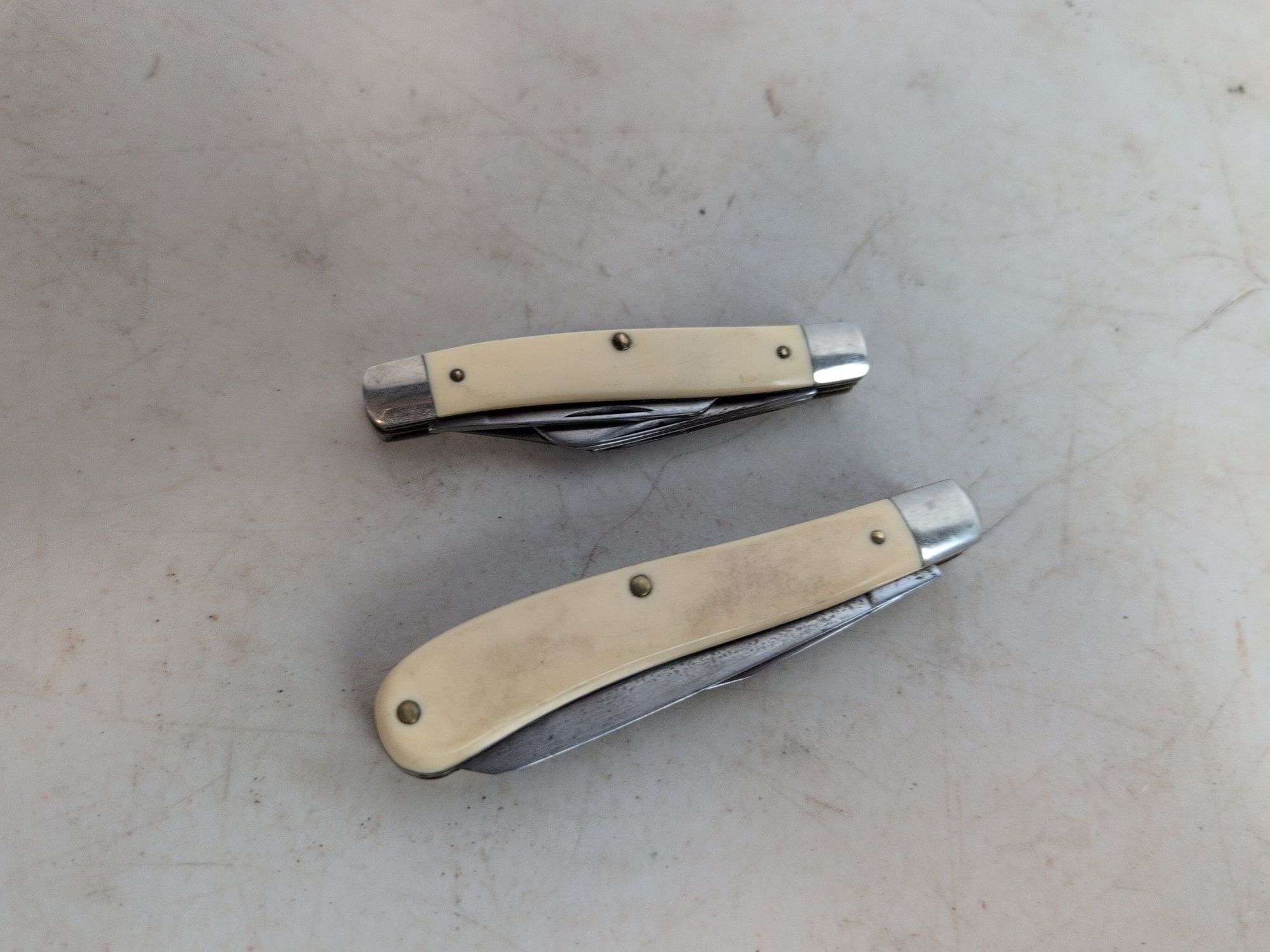 (2) Frontier pocket knives