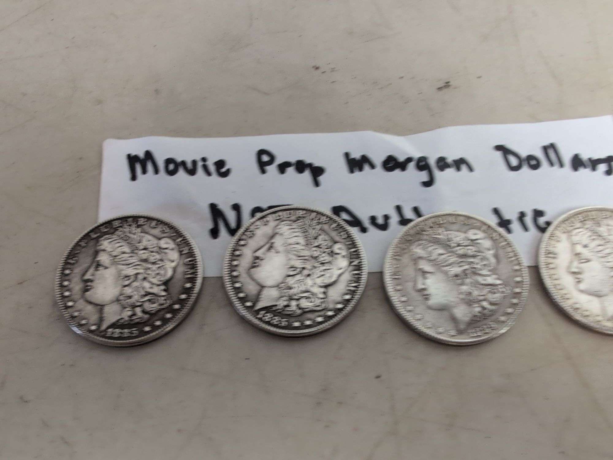 (4) movie prop Morgan Dollars - not authentic