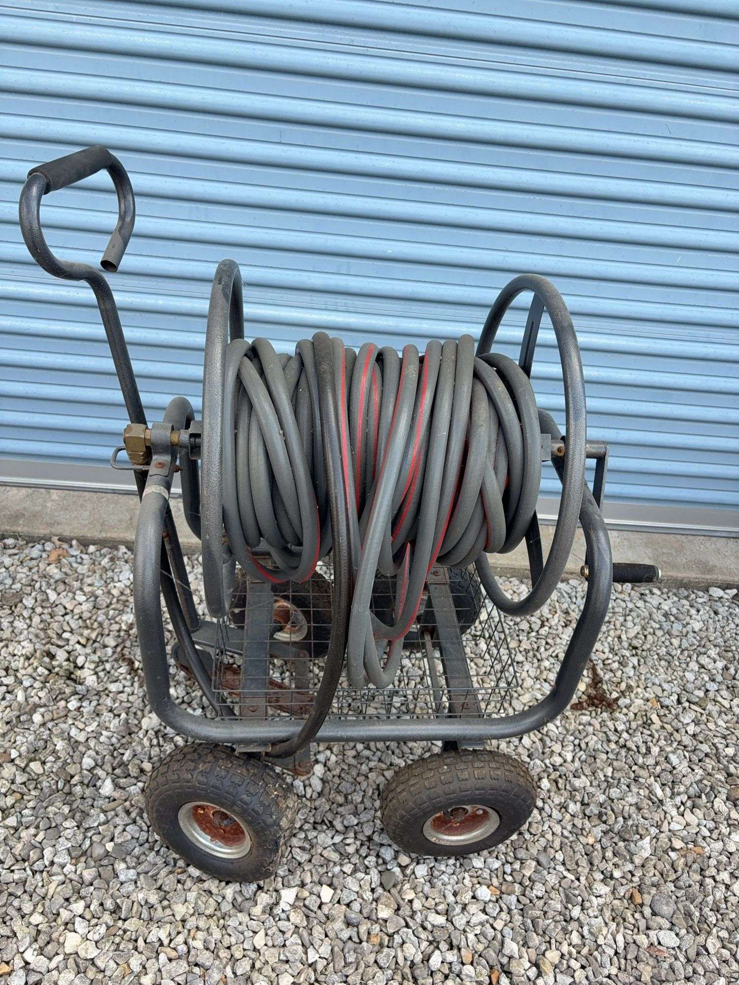 Garden hose with cart - most wheels are flat