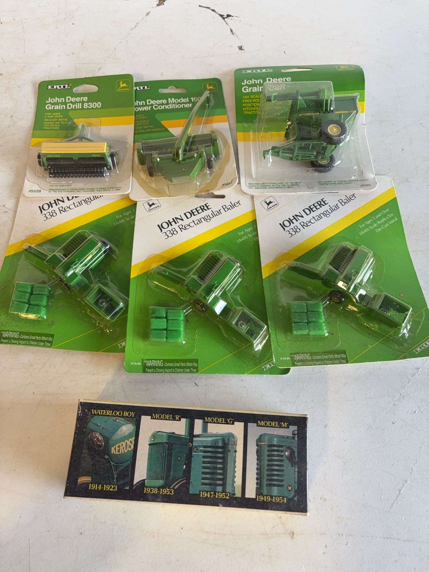 (7) John Deere toys - 1/64 scale, dirty