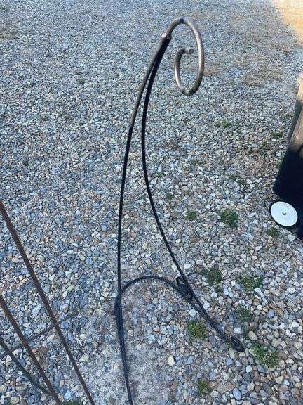 Assortment of garden decor/ plant stands, hanging basket hook and more