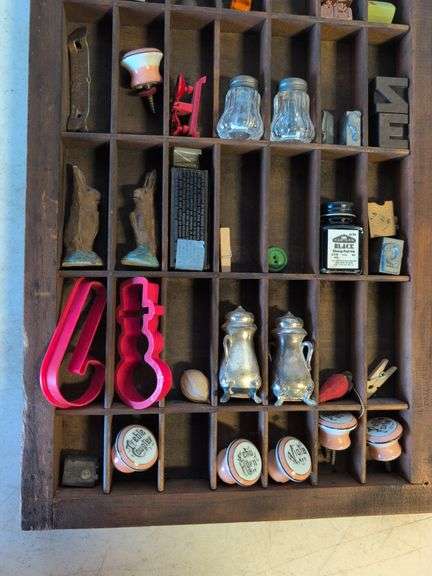 Shadow box with various vintage items - glass figures, print type blocks, and more