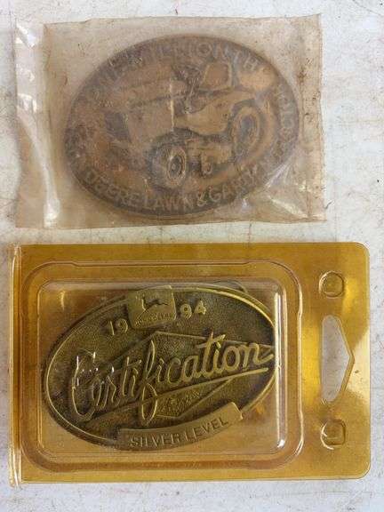 (6) John Deere belt buckles