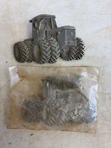 (6) John Deere belt buckles
