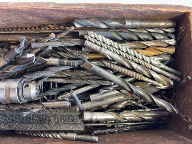 Wooden crate of miscellaneous drill bits