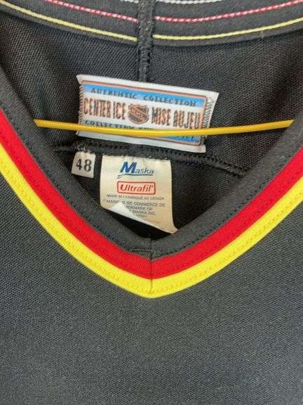 Vancouver Canucks authentic collection Hockey jersey, size 48