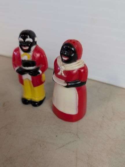 (2) black Americana salt and pepper shakers