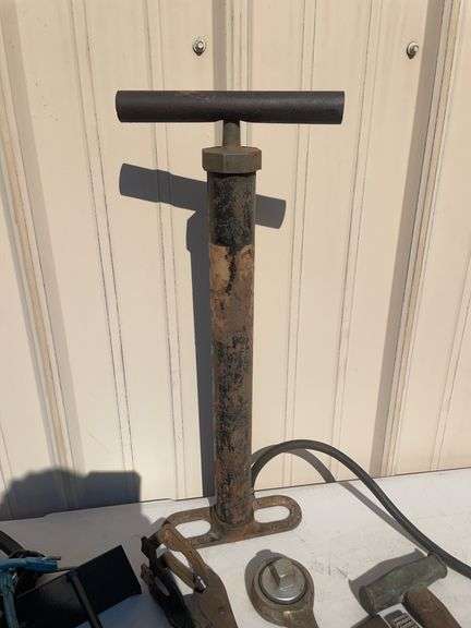 Lot of tools including pump, clamps, file and more