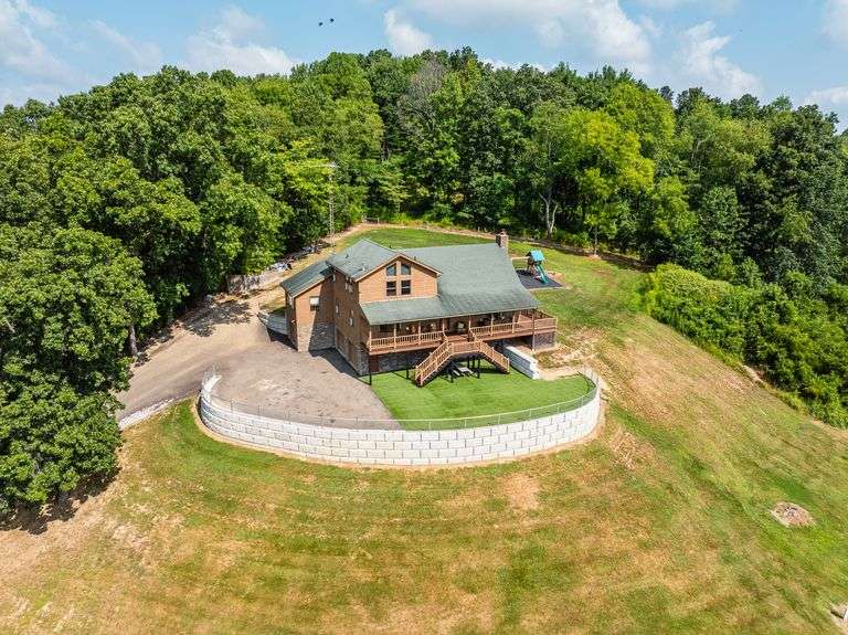 Lodge on 12 Acres with a Million Dollar View, Sold $533,500