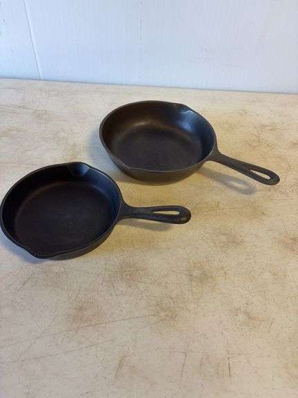 (2) small cast iron skillets