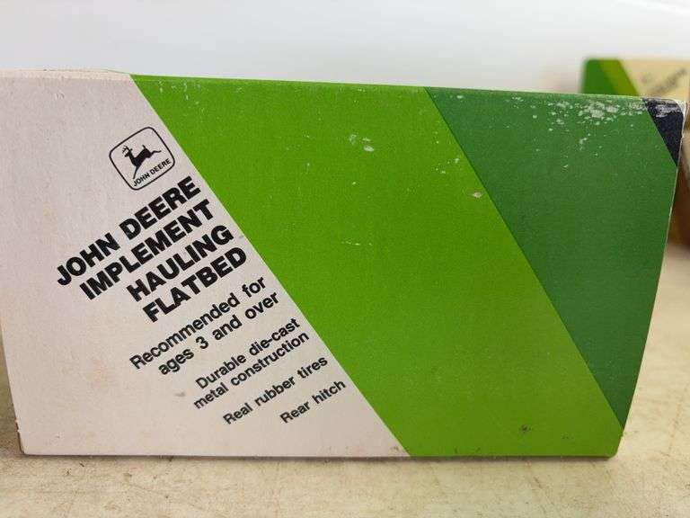 John Deere model milk tanker & John Deere model implement hauling flatbed - 1/64 scale, dirty