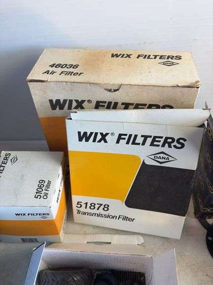 Tote of filters, parts, and more - John Deere, Wix, etc