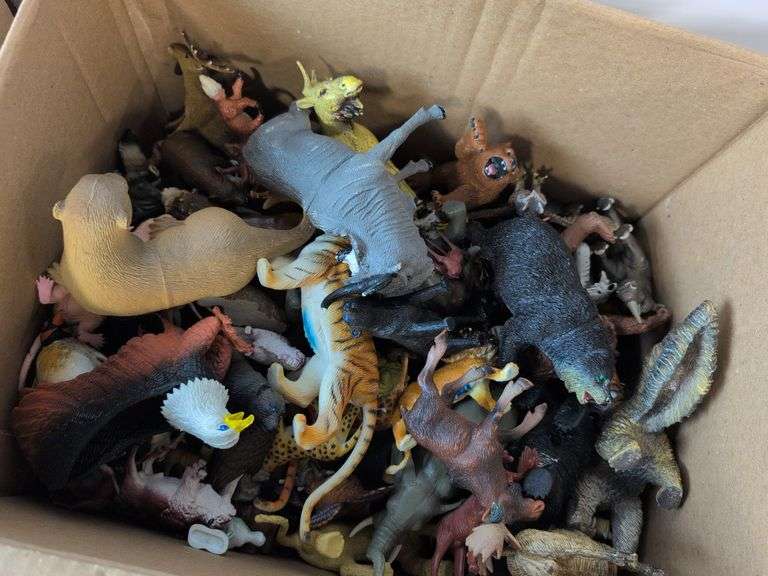 (4) boxes of toy animals