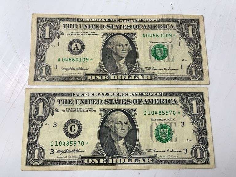 Two 1999 $1 Green Seal Star Notes