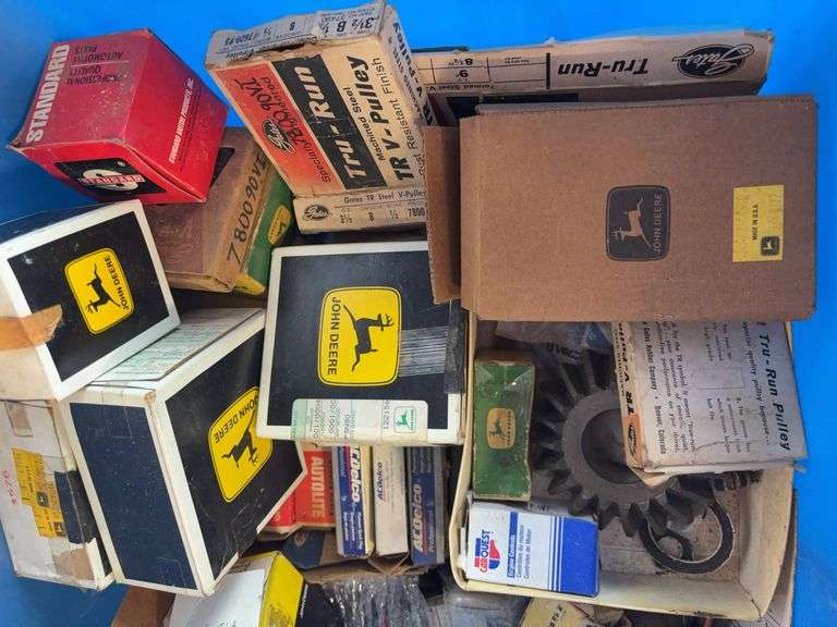 Tote of filters, parts, and more - John Deere, Wix, etc