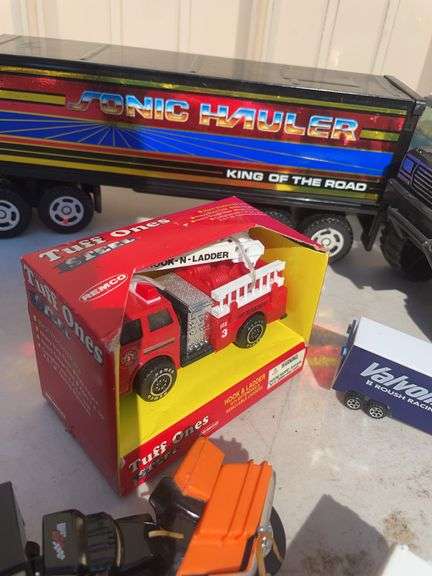 Box of toy cars/ trucks