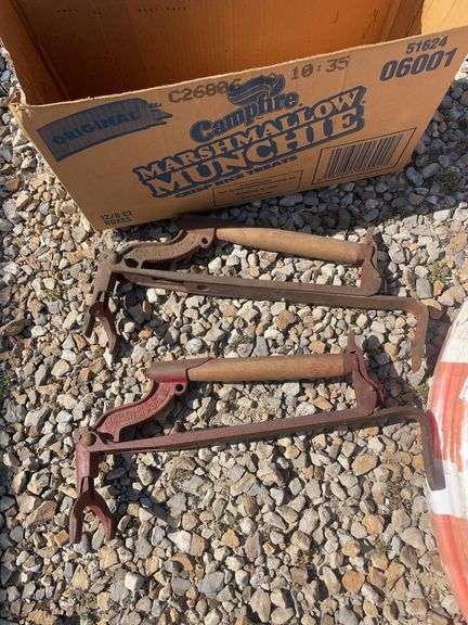 Metal drum, Pex tubing, vacuum hose and Fuller Brikarier brick carrier