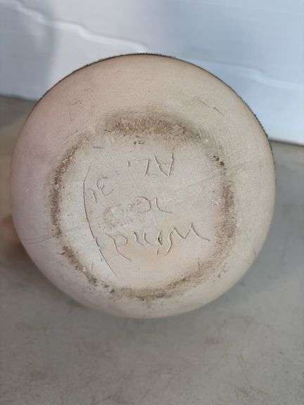 Vases with silk flowers, cups, and more