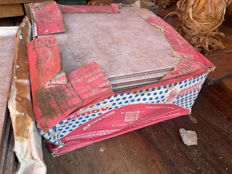 Large pile of wood and misc. tile flooring