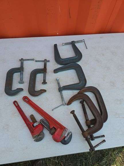 LOT OF PIPE WRENCHES AND C-CLAMPS