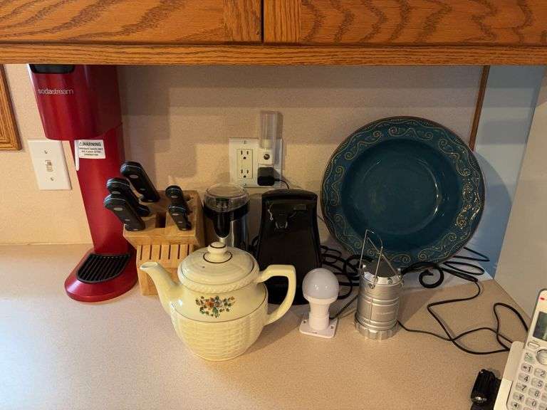 Soda stream, incomplete knife set, teapot, can opener, and Pier 1 stoneware playe