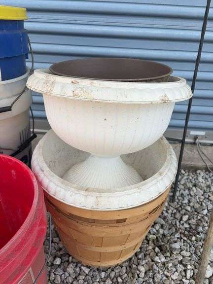 Assortment of buckets, planters and shepherds hook