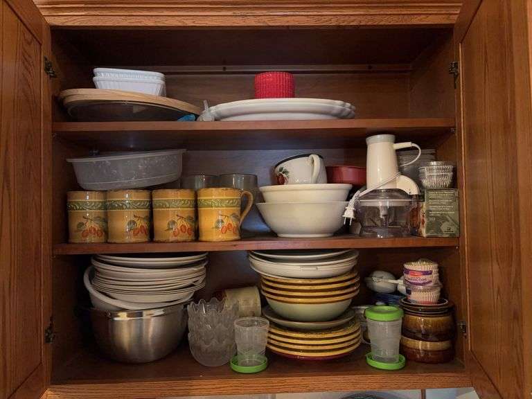 Shelves of miscellaneous plates and bowls