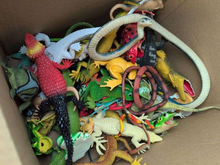 (4) boxes of toy animals