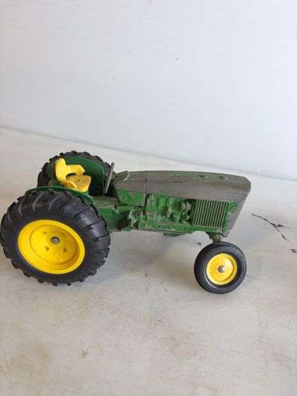 (2) John Deere die-cast model toy tractors