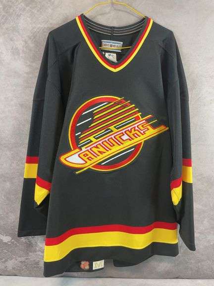 Vancouver Canucks authentic collection Hockey jersey, size 48