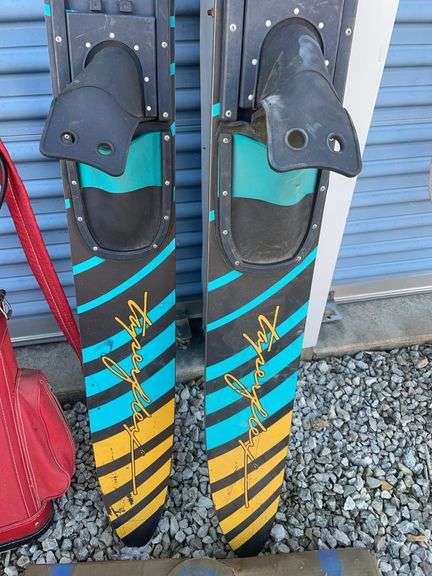 Golf bag with misc. clubs, skis and horseshoe game