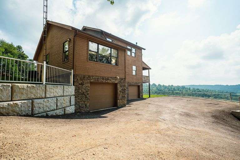 Lodge on 12 Acres with a Million Dollar View, Sold $533,500