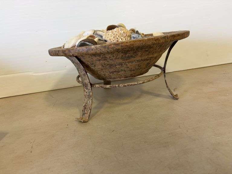 Decorative bowl with stand and shells