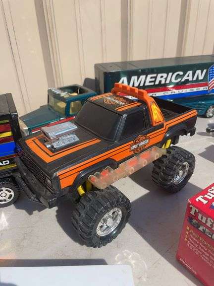 Box of toy cars/ trucks