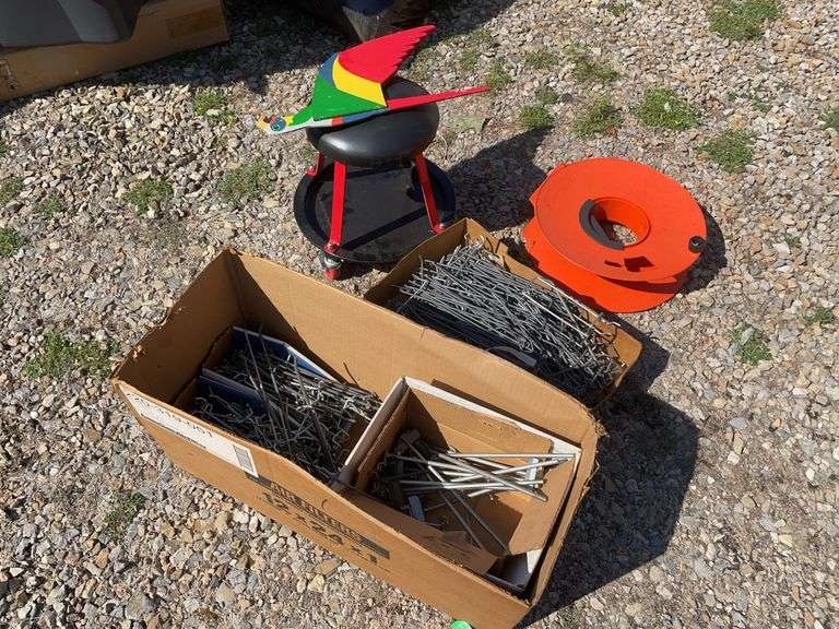 (2) boxes of hooks/shelving, mechanics chair and cord wheel