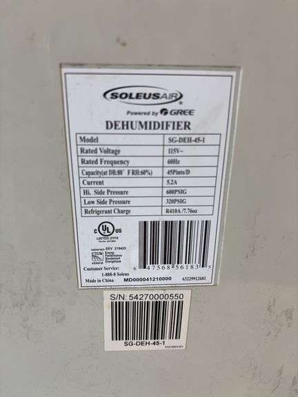 Soleus Air dehumidifier and camo foldable chair