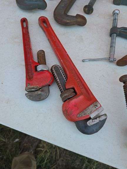 LOT OF PIPE WRENCHES AND C-CLAMPS