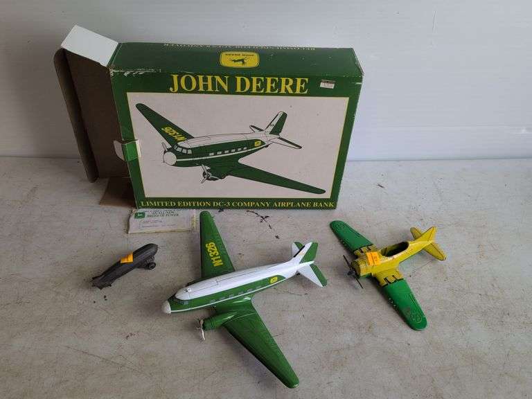 John Deere airplane bank and (2) other metal plane toys