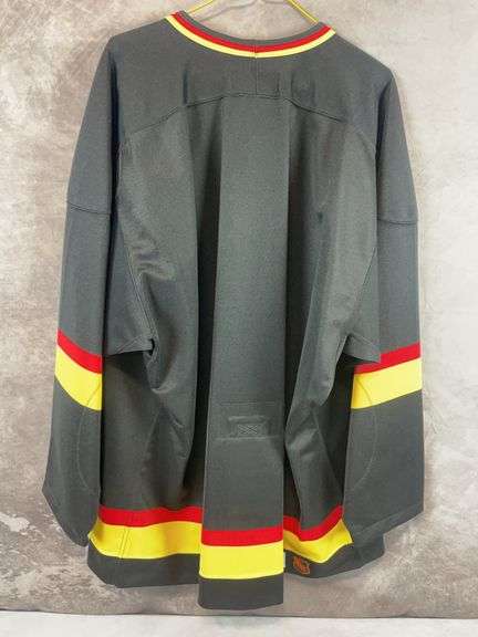 Vancouver Canucks authentic collection Hockey jersey, size 48
