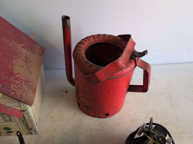 Small metal bell, watering can, and more