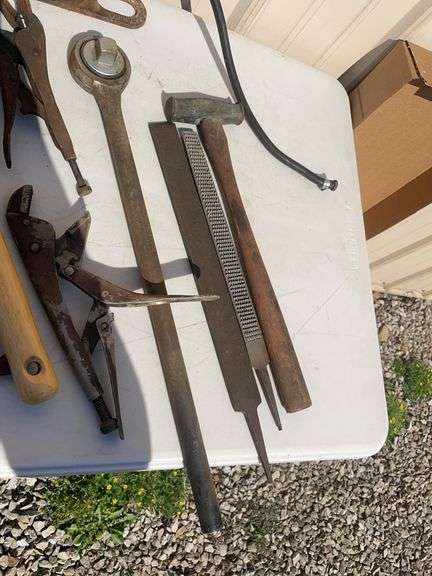 Lot of tools including pump, clamps, file and more