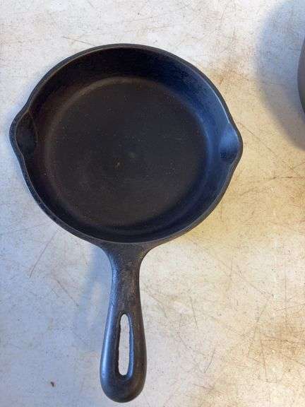 (2) small cast iron skillets