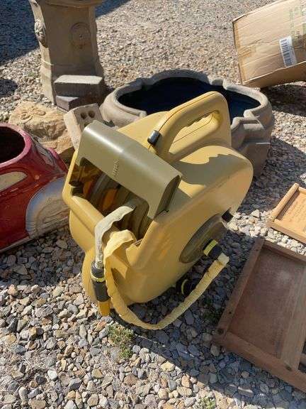 Large lot of outdoor items including fountains, garden hose with reel, plant stand, basket, planters