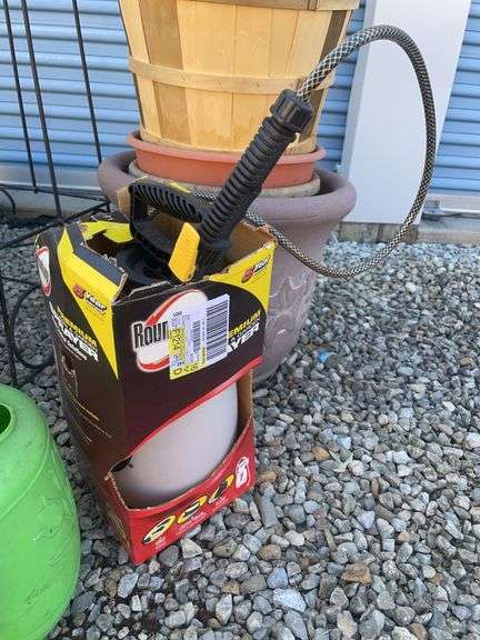 Assortment of Planters, sprayer, bird house, decorative stand and watering can