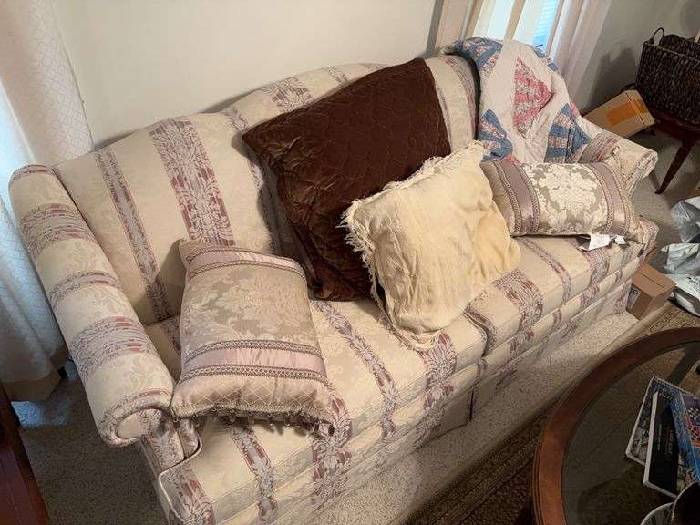 2 matching sofas 78” x 36” x 30” and pillows