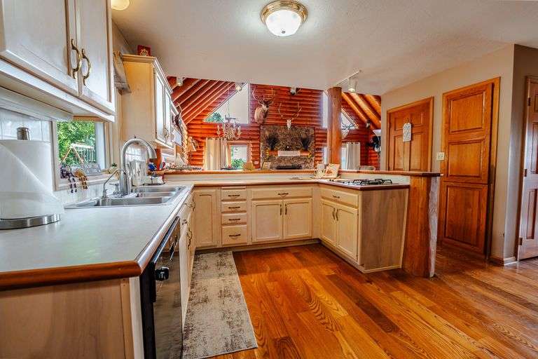 Lodge on 12 Acres with a Million Dollar View, Sold $533,500