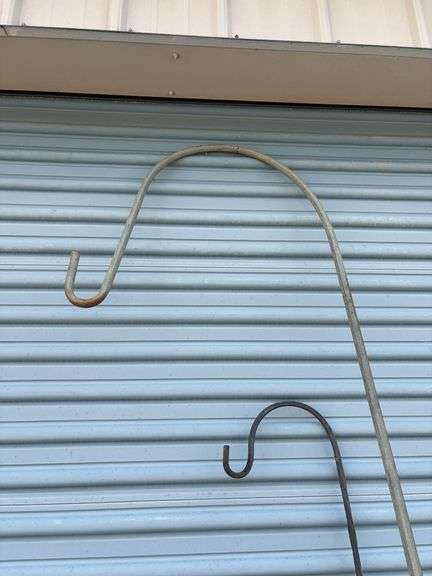 Assortment of buckets, planters and shepherds hook