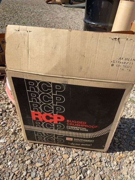 Metal drum, Pex tubing, vacuum hose and Fuller Brikarier brick carrier